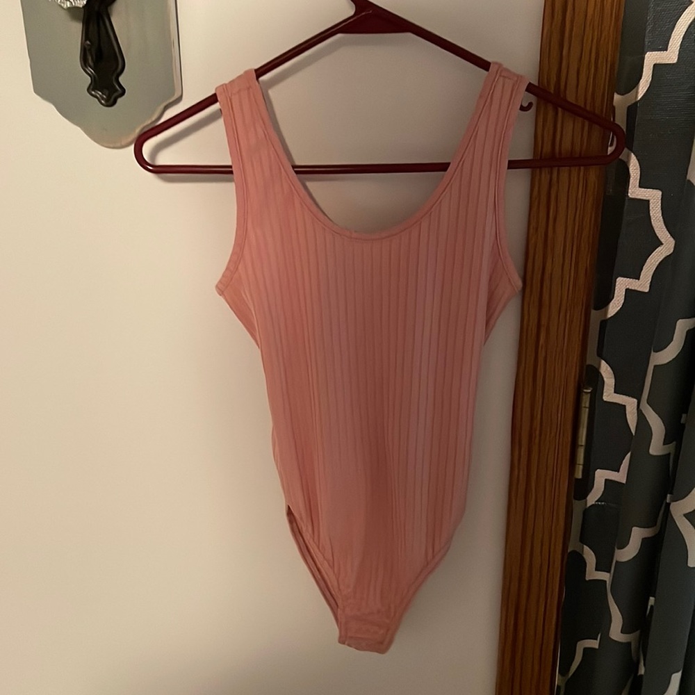 Pink body suit